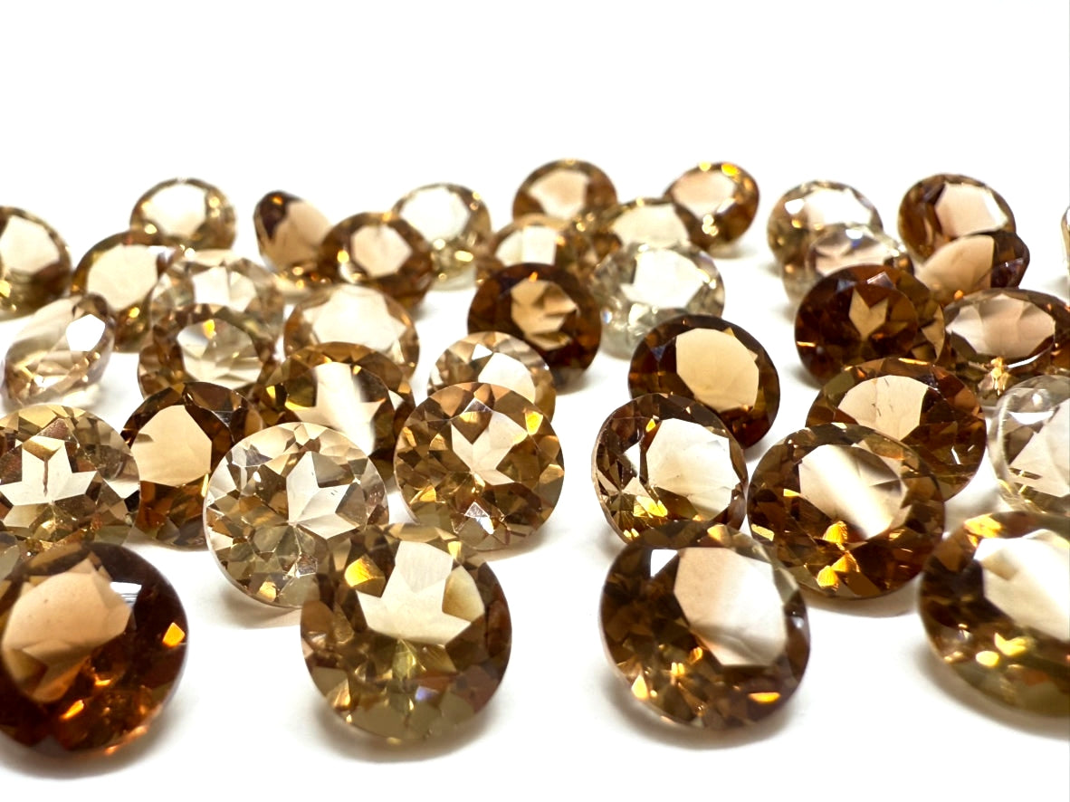 0020【ランダム発送】ラウンドファセットカット シャンパントパーズ 【1石あたり平均1.52ct】