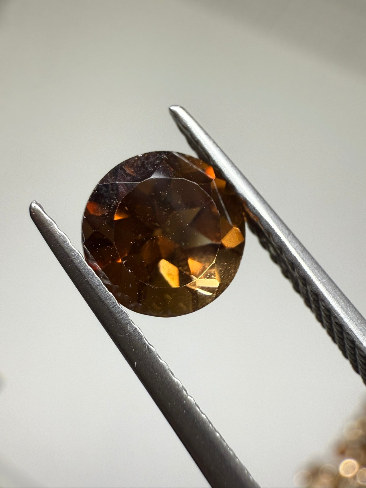 0020【ランダム発送】ラウンドファセットカット シャンパントパーズ 【1石あたり平均1.52ct】