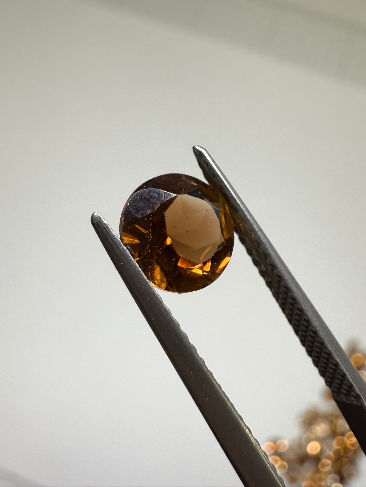 0020【ランダム発送】ラウンドファセットカット シャンパントパーズ 【1石あたり平均1.52ct】