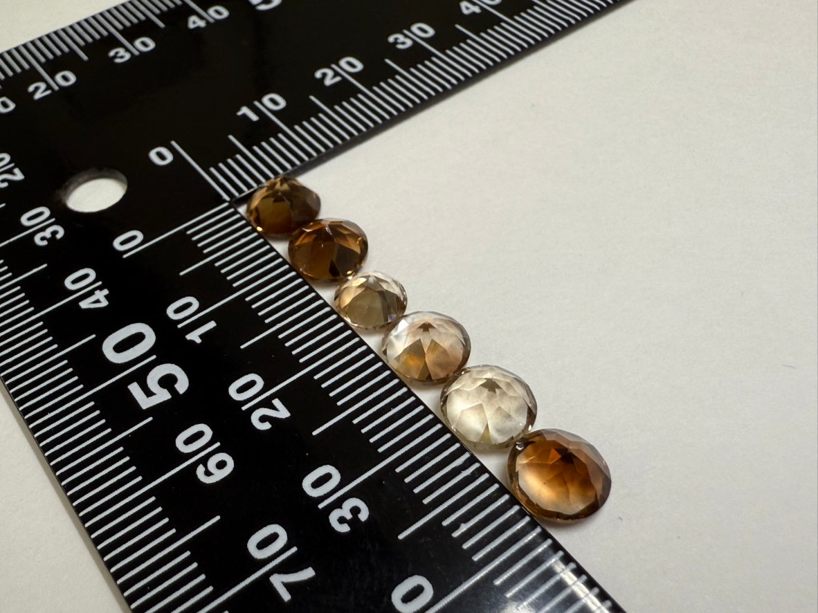 0020【ランダム発送】ラウンドファセットカット シャンパントパーズ 【1石あたり平均1.52ct】