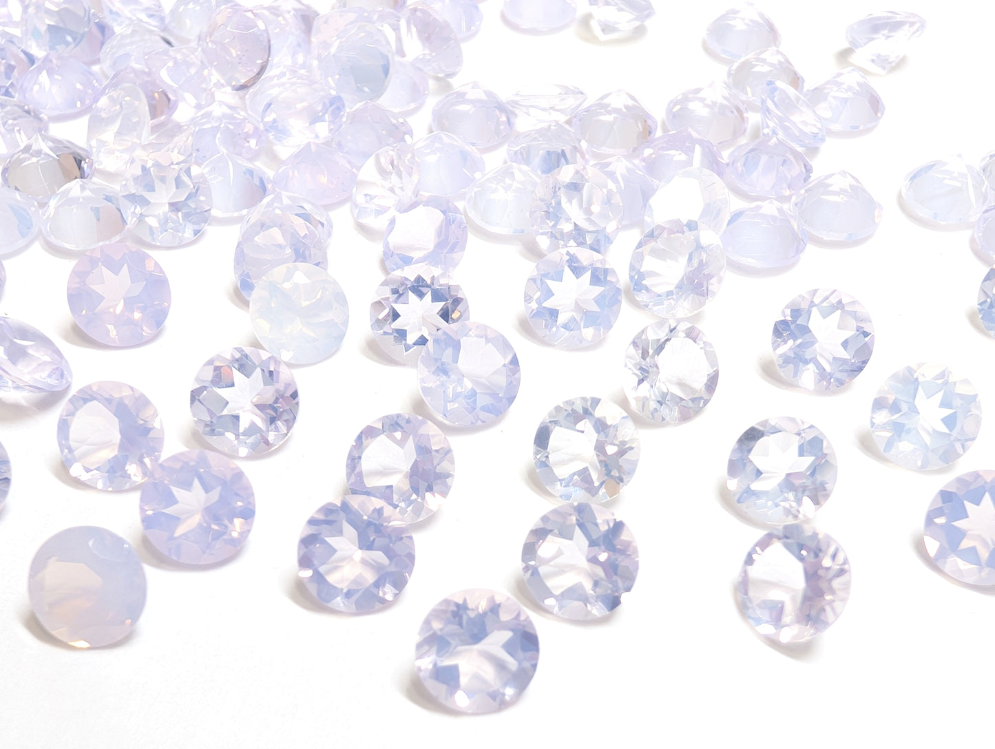 0425【ランダム発送】1石500円!シルキーラベンダー💜ラウンドカットの『スコロライト』【1石あたり0.74ct】