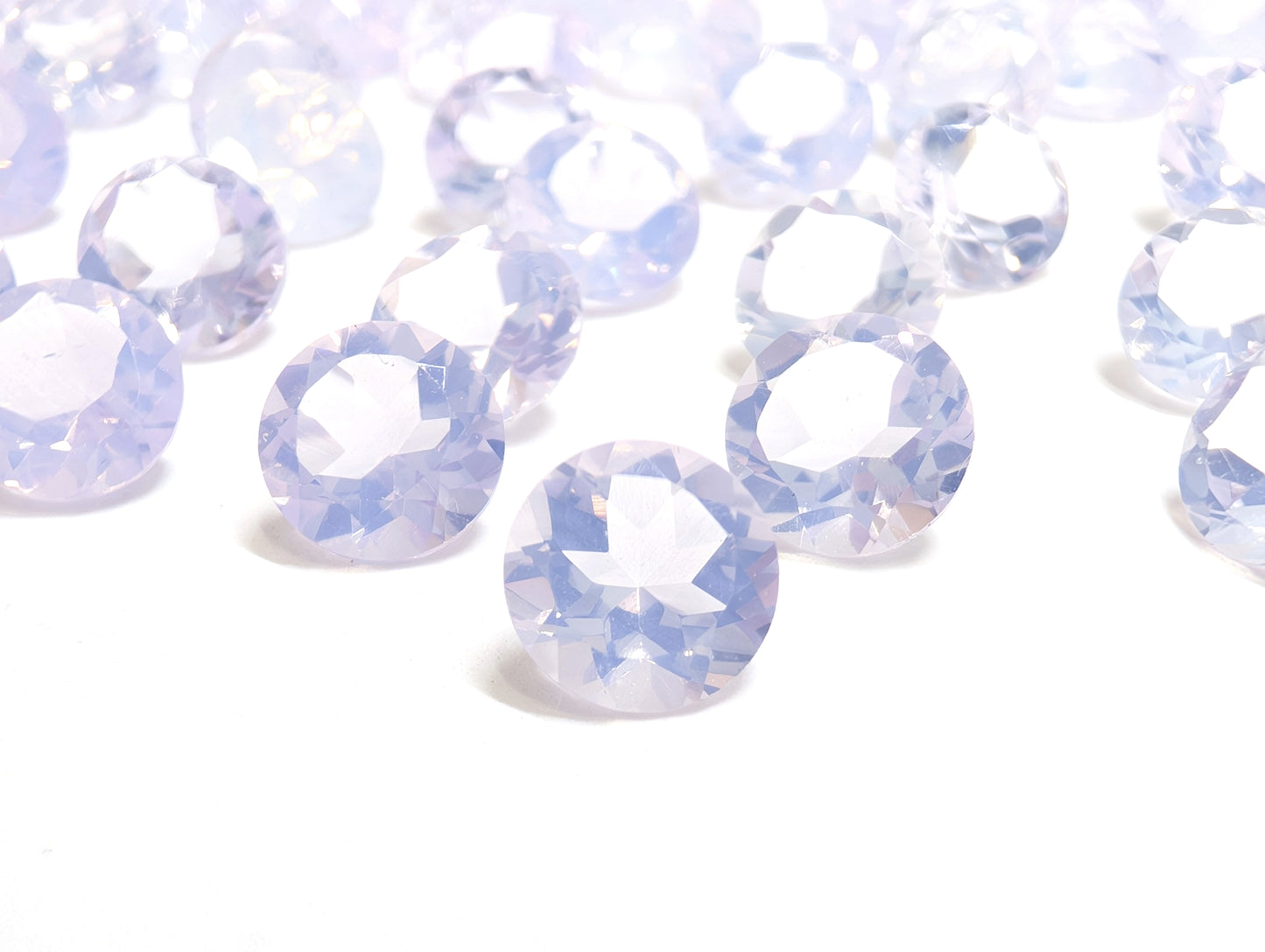 0425【ランダム発送】1石500円!シルキーラベンダー💜ラウンドカットの『スコロライト』【1石あたり0.74ct】
