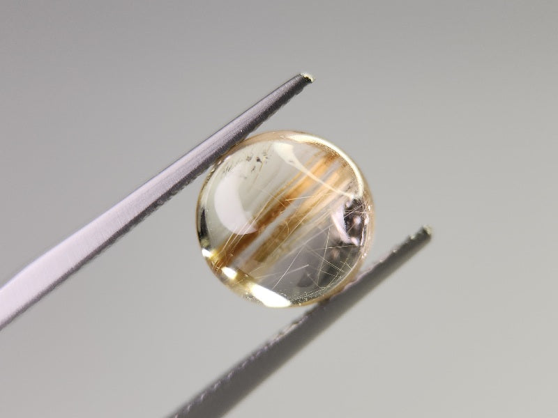 rQ-ce-2 ルチルクォーツキャッツアイ 3.89ct – 東洋ルース公式