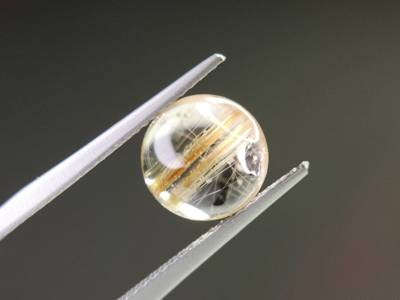 0107-2-2　ルチルクォーツキャッツアイ　3.89ct