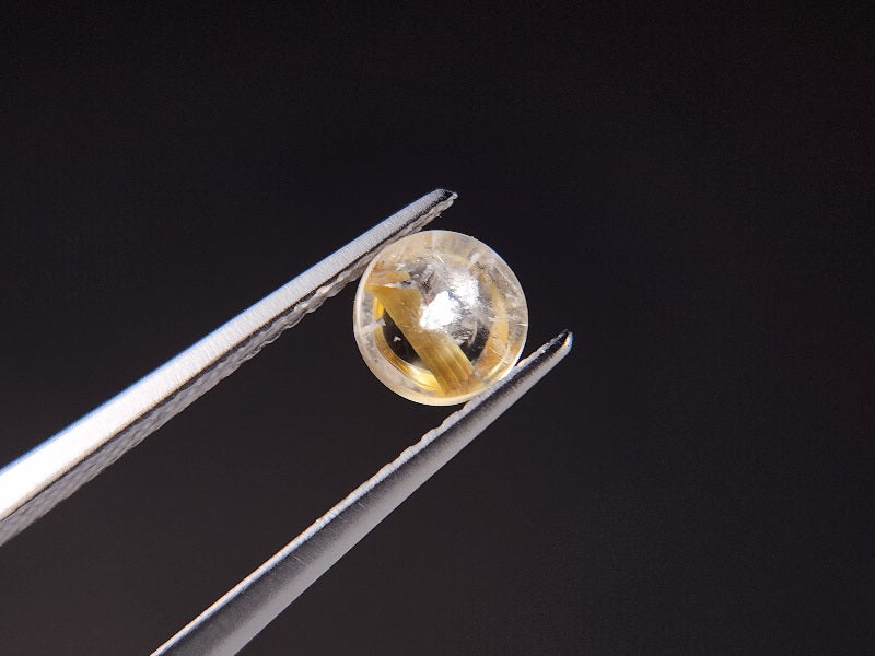 rQ-ce-7　ルチルクォーツキャッツアイ　0.98ct
