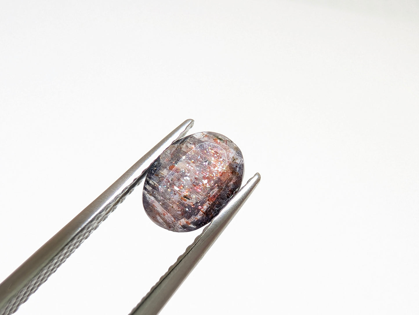 0143　アイオライトサンストーン　0.88ct