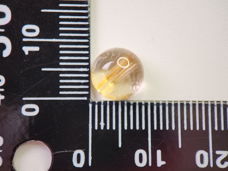 0107-2-2　ルチルクォーツキャッツアイ　3.89ct